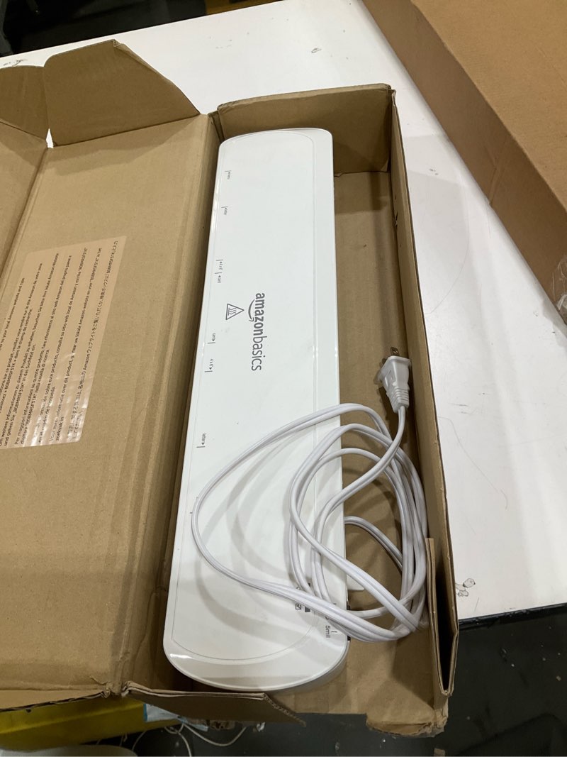 Condition photo showing Good Condition for amazon basics 12-inch thermal laminator machine, 1 min fast warm-up, for documents photos, home/office/school use, 20 pouches included, white 12-inch + 20 pouches