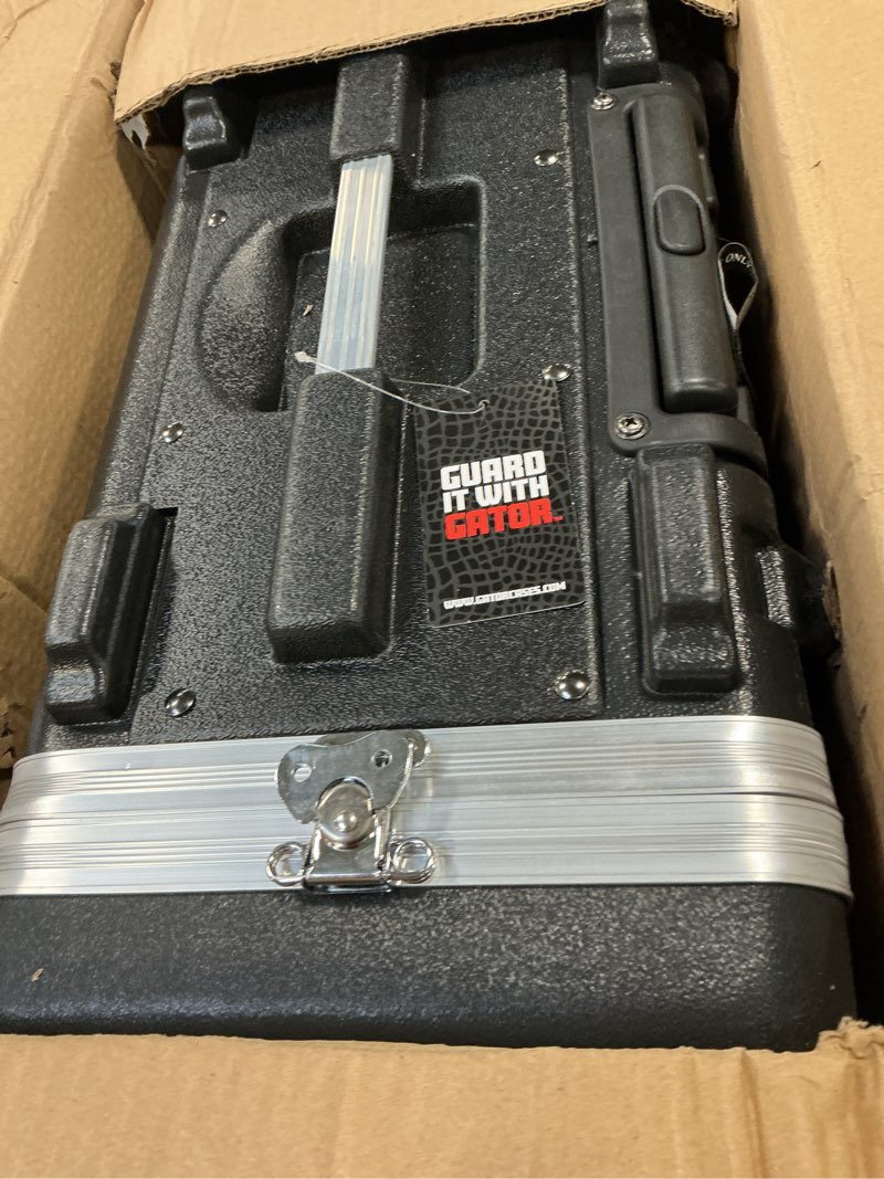 Condition photo showing Good Condition for Gator Cases Lightweight Molded 4U Rack Case with Built-in Power Supply, Heavy Duty Latches, Retractable Tow Handle, and Recessed Wheels; 19.25" depth (GRR-4PL-US)