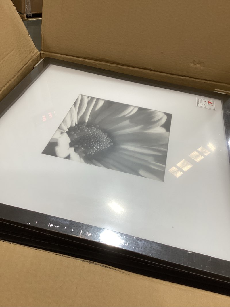 Condition photo showing Good Condition for homerhyme 5x7 picture frame set 8 pack, black picture frames for wall or tabletop display, fits pictures 4x6 with mat or 5x7 without mat, poster photo frame with plexiglass for gallery home wall decor 5"x 7" black*8