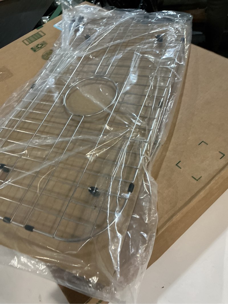 Condition photo showing Good Condition for serene valley sink bottom grid 27-9/16" x 15-1/2", centered drain with corner radius 3/8", sink protector ndg2816c