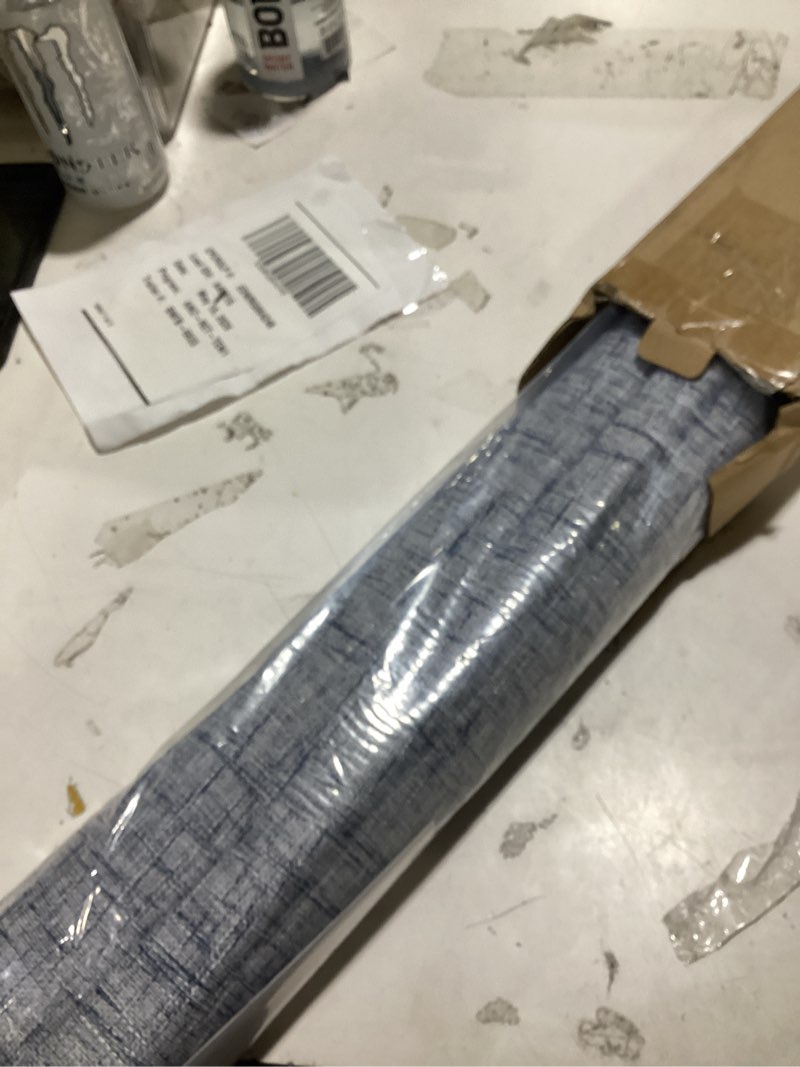 Condition photo showing As Is for sun zero seraphina textured 100% blackout cordless roman shade, 27" x 64", blue