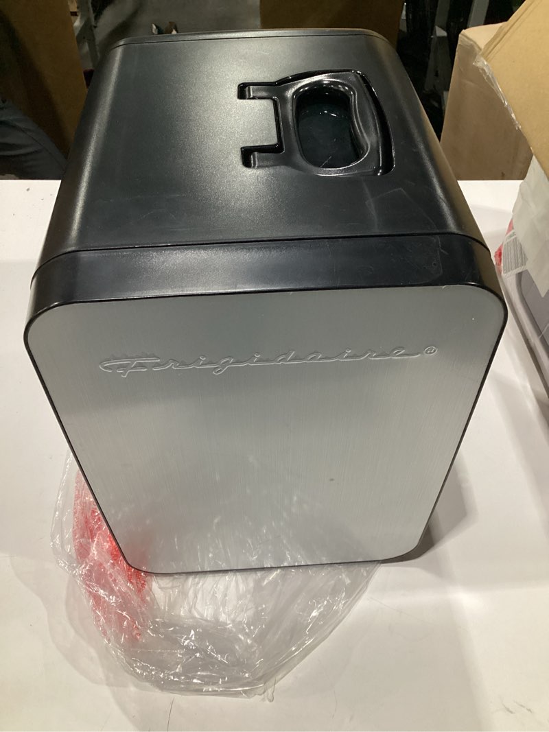 Condition photo showing As Is for FRIGIDAIRE Portable 10L, 15-can Mini Fridge Brushed Stainless Rugged Refrigerator, EFMIS188-SS