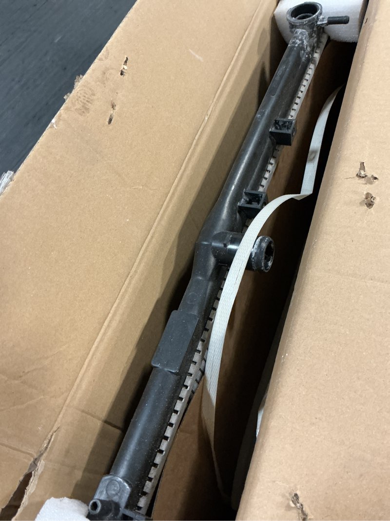 Condition photo showing As Is for autosity cu1909 radiator, compatible with camry 1997-2001, solara 1999-2001, aluminum automotive rep