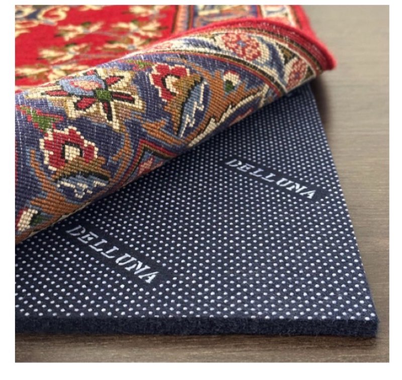 Blue premium rug pad, size unknown 