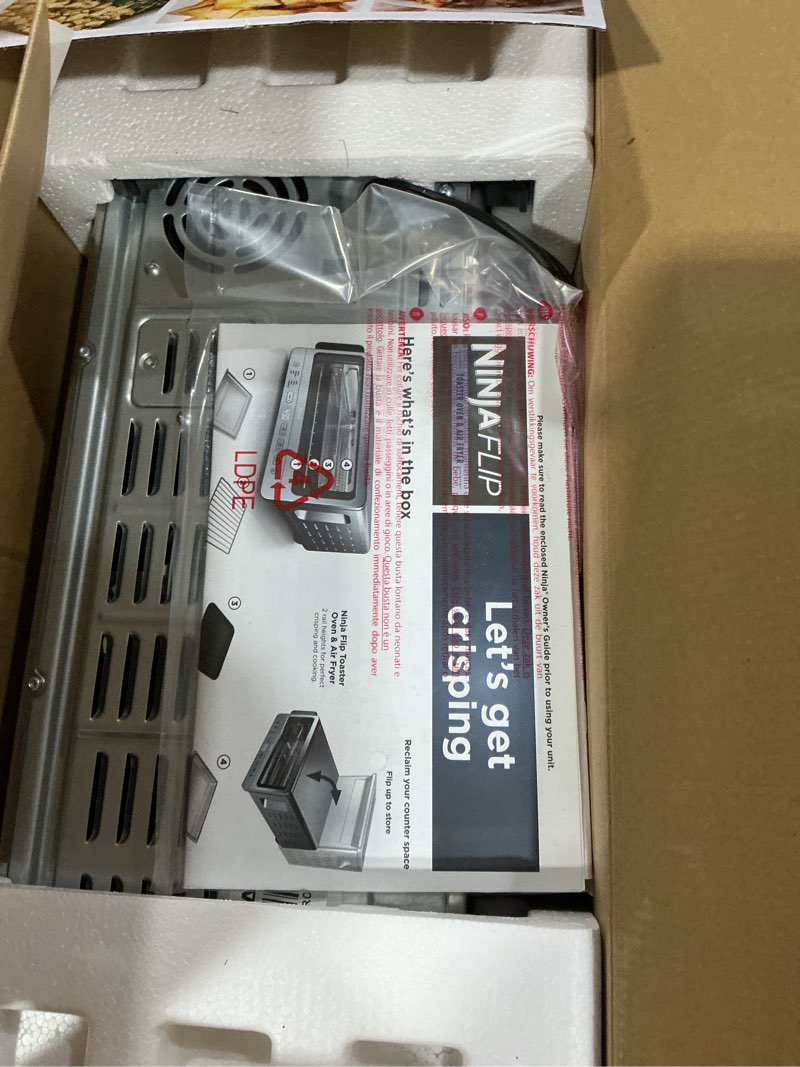 Condition photo showing As Is for ninja air fryer toaster oven combo | 8-in-1 functionality | flip up & away for storage space | air fry basket, sheet pan, wire rack & removable crumb tray |1800 watt | stainless steel | sp151 stainless premium 8-in-1 flip oven