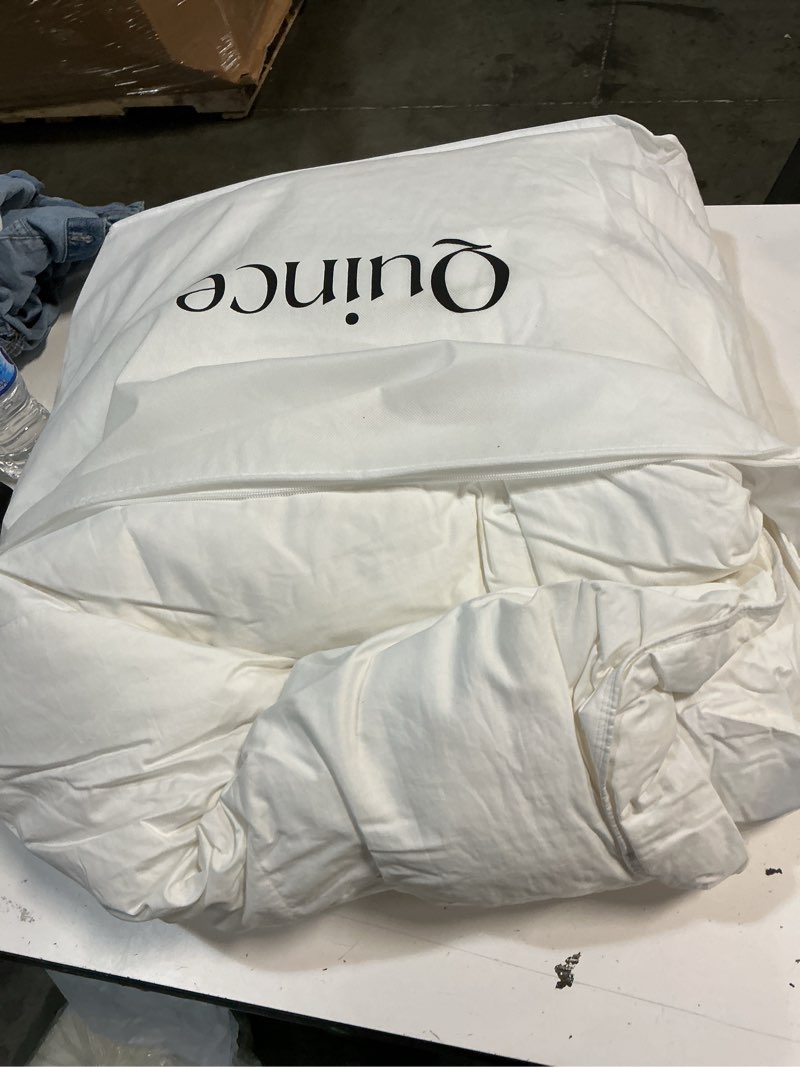 Condition photo showing As Is for quince all-season premium down alternative comforter, king/cal king, white