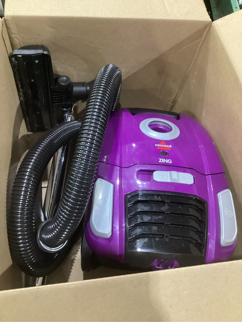Condition photo showing As Is for (used, not tested)bissell zing lightweight, bagged canister vacuum, purple, 2154a zing canister purple