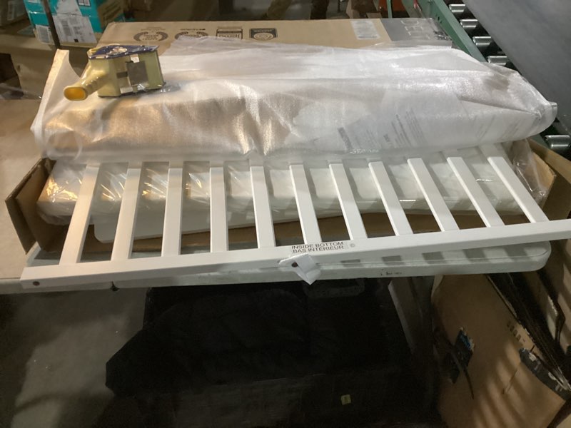 Condition photo showing New/Like New for Delta Children Folding Portable Mini Baby Crib with 1.5-inch Mattress - Greenguard Gold Certified, White White Crib