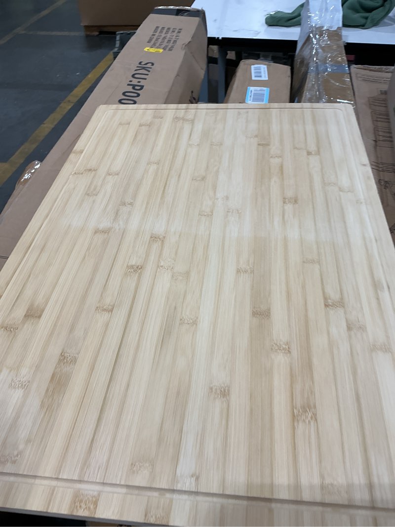 Condition photo showing New/Like New for kikcoin 17”×11” bamboo cutting boards for kitchen, healthy wooden cutting boards for kitchen, charcuterie, vegetables, cheese, extra large chopping boards with deep juice groove and handle, natural natural 17"l x 11"w