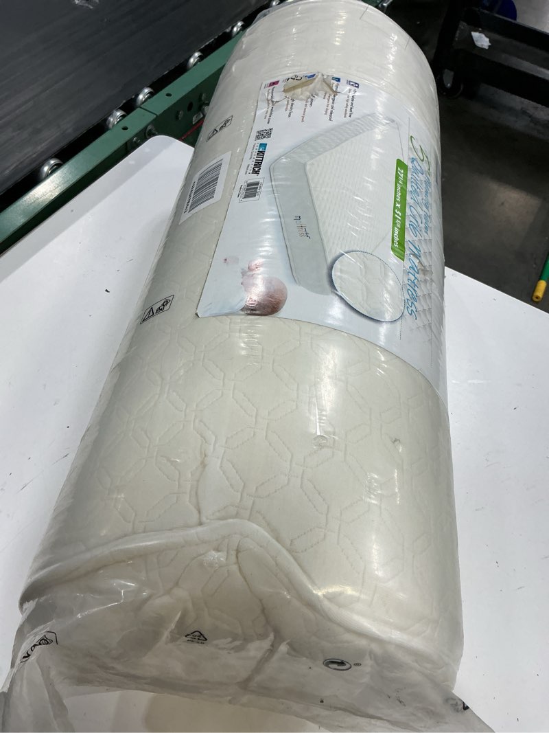 Condition photo showing New/Like New for my first crib mattress, memory foam crib mattress, removable waterproof cover, quilted, hypoallergenic
