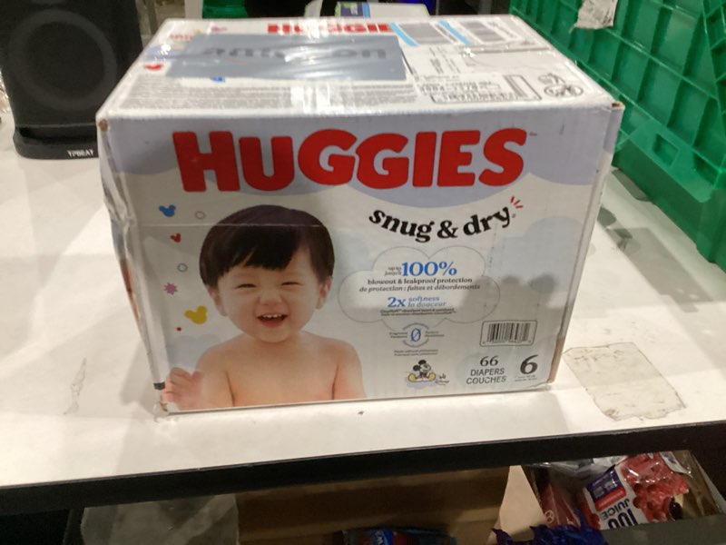 Condition photo showing New/Like New for Huggies Size 6 Diapers, Snug & Dry Baby Diapers, Size 6 (35+ lbs), 66 Count, Packaging May Vary Size 6 66