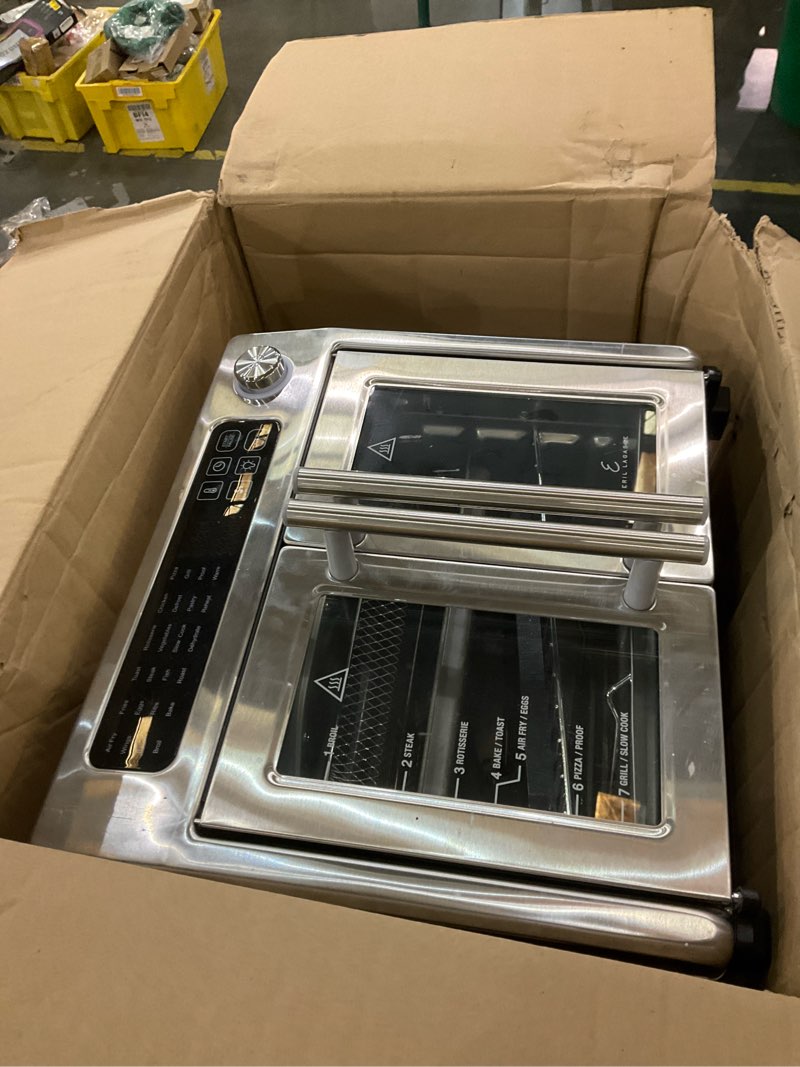 Condition photo showing As Is for Emeril Lagasse Extra Large French Door Air Fryer Toaster Oven Combo, 24 Cooking Functions and Digital Controls, 7 Accessories Included, Stainless Steel Finish, 26QT Capacity