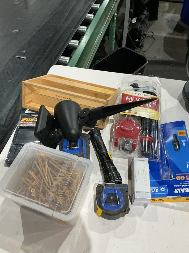 Condition photo showing As Is for assorted home improvement lot (small tools, screw, home accessories, etc.)