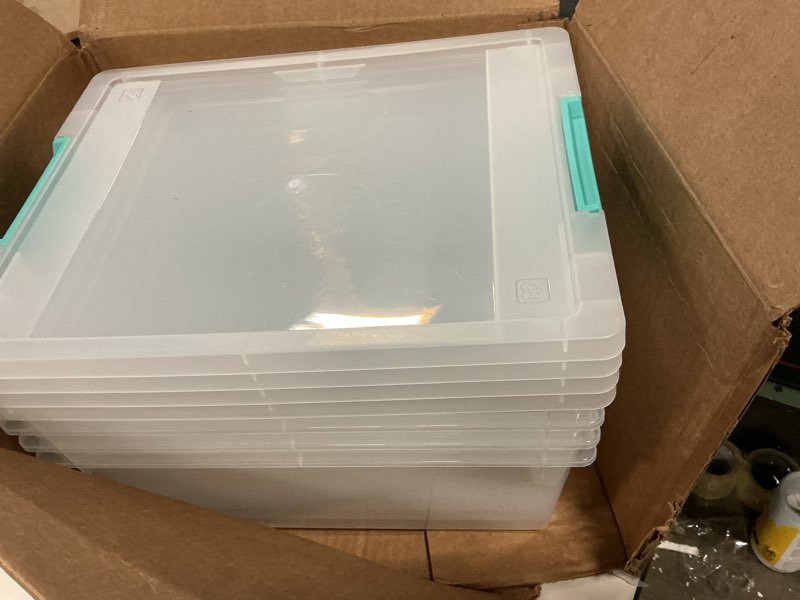 Condition photo showing Good Condition for IRIS USA 12 Qt. Plastic Storage Bins Containers with Lids, 4 Pack, Small Sensory Bin, Craft Storage, Craft Organizers & Storage, Organizing Container for Home, Office & Art Supplies, Stackable, Clear 12 Qt. - 4 Pack
