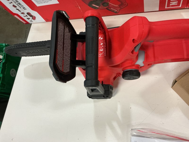 Condition photo showing As Is for craftsman v20 cmccs610d1 10 in. 20 v battery chainsaw kit (battery & charger)