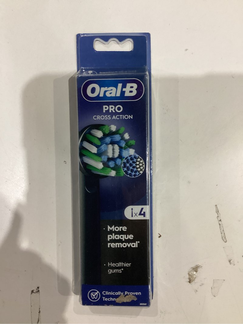 Condition photo showing New/Like New for oral-b crossaction electric toothbrush replacement brush head refills, black , 4 count (pack of 1)
