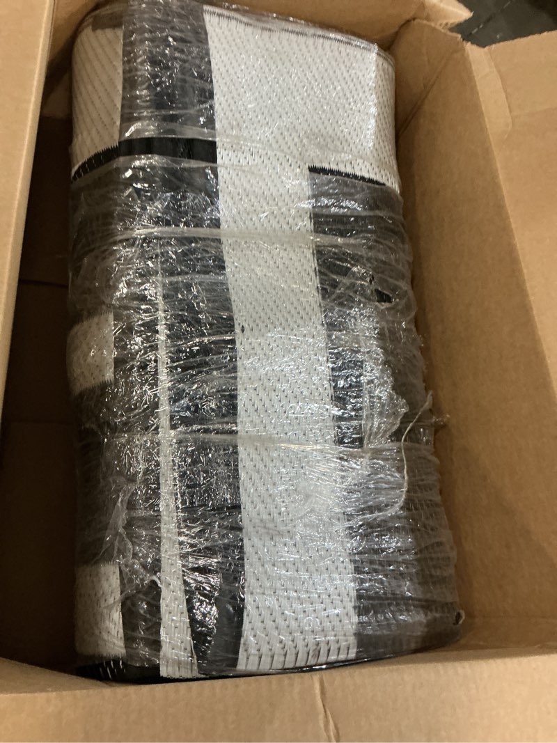 Condition photo showing Good Condition for olanly outdoor rug 8x10 ft waterproof, reversible outdoor plastic straw rug, rv mat, indoor outdoor carpet clearance for patio, camping, balcony, deck, backyard, black & white black & white geometric 8' x 10' (rectangular)