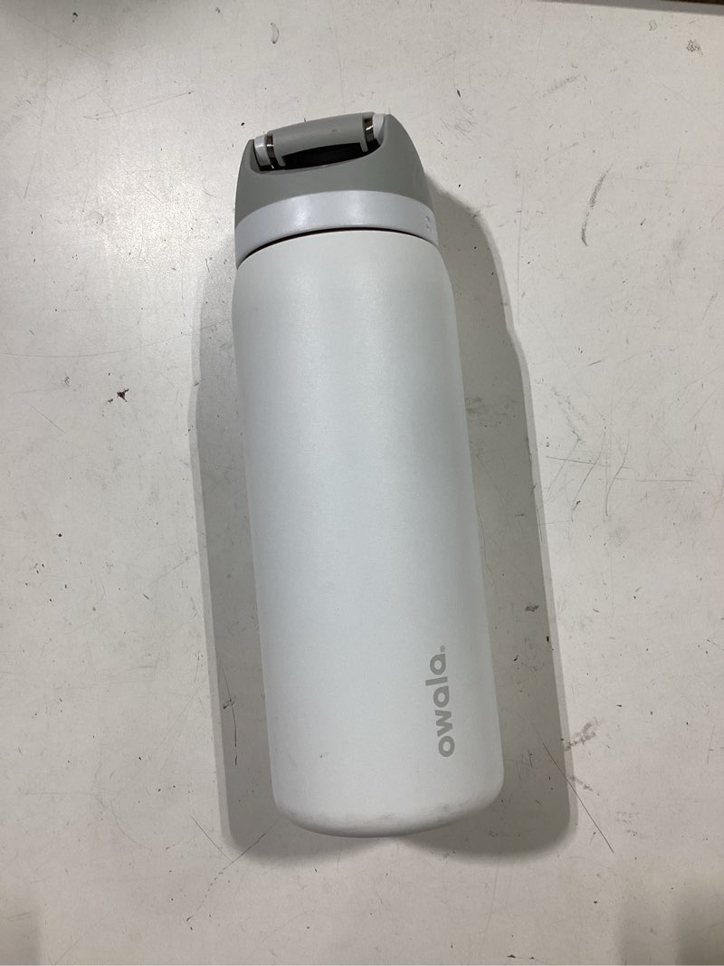 Condition photo showing As Is for owala freesip insulated stainless steel water bottle with straw, bpa-free sports water bottle, great for travel, 32 oz, shy marshmallow shy marshmallow 32 ounces