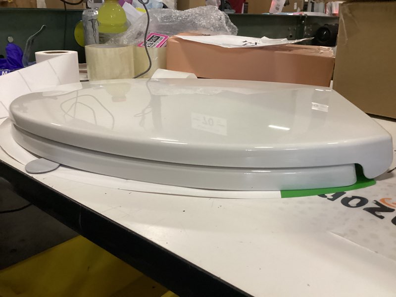 Condition photo showing New/Like New for khe elongated toilet seat with child seat 18.5 inch, soft close toilet seat with no-touch handle, quick release, non-slip, durable pp, white elongated 18.5'' withtoddler seat