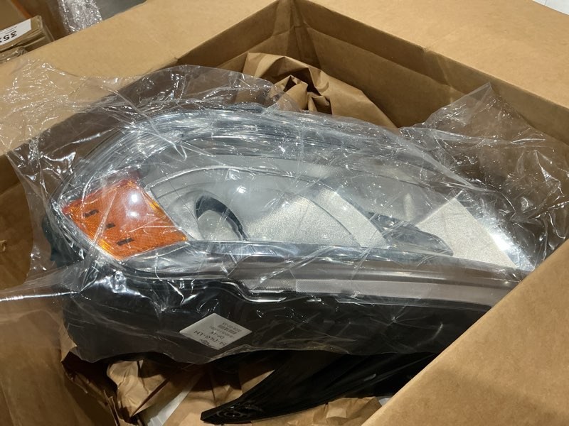 Condition photo showing Good Condition for tyc left headlight assembly compatible with 2014-2015 dodge durango