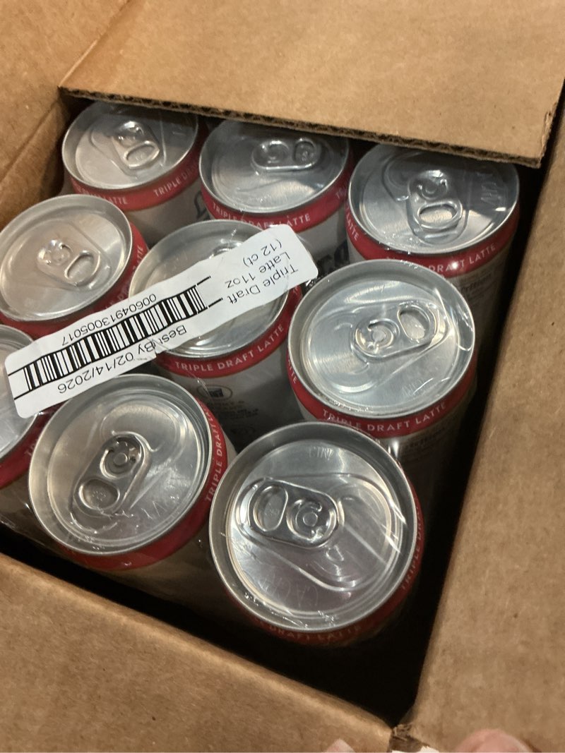 Condition photo showing Good Condition for (BEST IF BY :02/13/2026) La Colombe Coffee, Triple Draft Latte, 11 fl oz Cans (Pack of 12), Coffeehouse Quality Cold Brew, Specialty Grade Coffee Beans, Ready-to-Drink On-the-Go Triple 11 Fl Oz (Pack of 12)