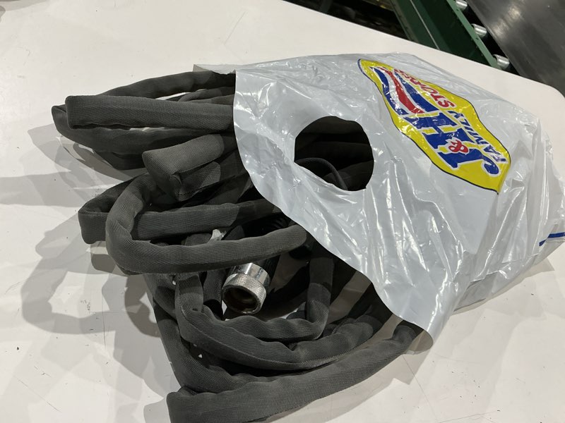 Condition photo showing As Is for zero-g 4001-50 lightweight, ultra flexible, durable, kink-free garden hose, 5/8-inch by 50-feet,black hose solid 5/8" x 50'
