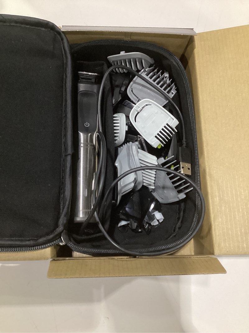 Condition photo showing As Is for (not tested, used)philips norelco multi groomer 23 piece mens grooming kit, trimmer for beard, head, body, and face - no blade oil needed mg9520/50