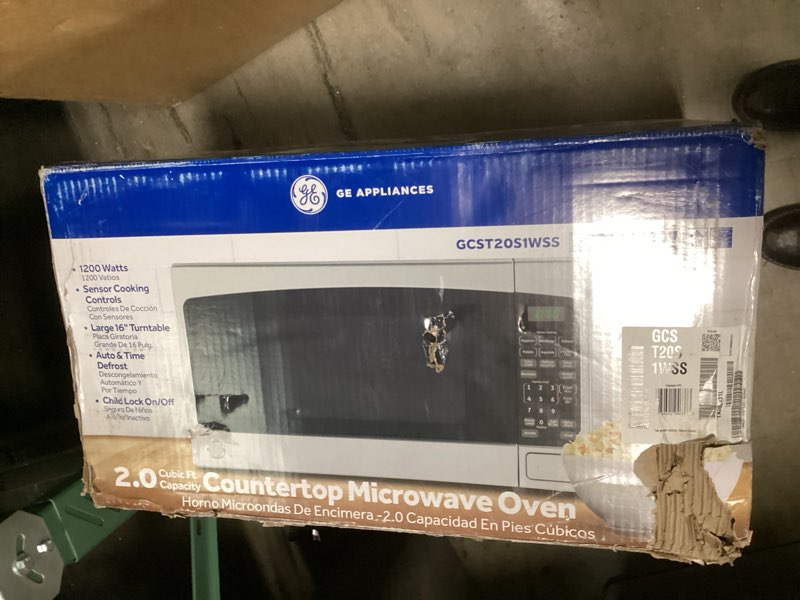 Condition photo showing New/Like New for GE Countertop Microwave Oven,1, 200-watt Capacity, 2.0 Cubic Ft., 8 Auto Setting Cooking Settings, Child-Lock Technology, Kitchen Essentials for the Countertop, Dorm Room or Apartment, Stainless Steel 2.0 Cu.Ft. Stainless Steel