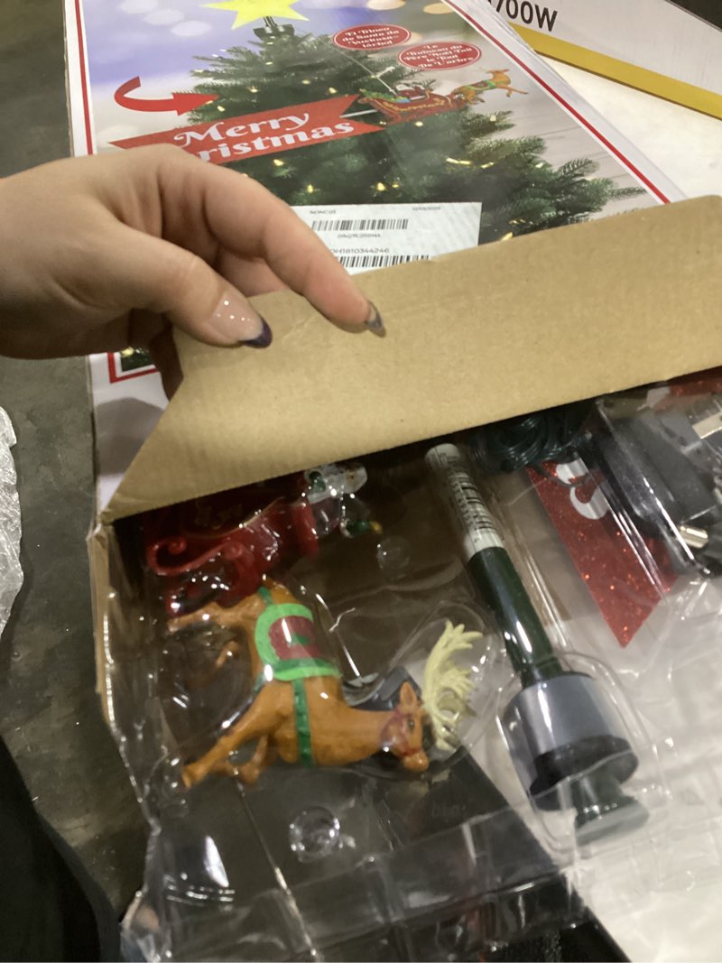 Condition photo showing Good Condition for Mr. Christmas Santa’s Sleigh Animated Tree Topper with Banner,Red (8-Inch)