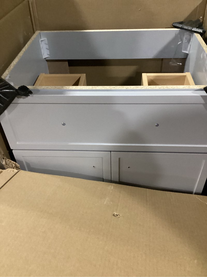 Condition photo showing As Is for SIMILAR TO STOCK PHOTO..  POSSIBLY INCOMPLETE.. OLD CAPTAIN Bathroom Vanity with Ceramic Sink, Wooden Double Door Bathroom Storage Vanity with 24 Inch, Small Quick Assembly Cabinet with Sink, White (Grey) Grey 24 Inch