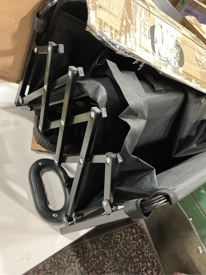 Condition photo showing Good Condition for folding wagon cart portable collapsible beach wagon cart outdoor sports wagon camping wagon heavy duty utility cart with adjustable handle for grocery, garden, beach, sport, shop, camping(black)