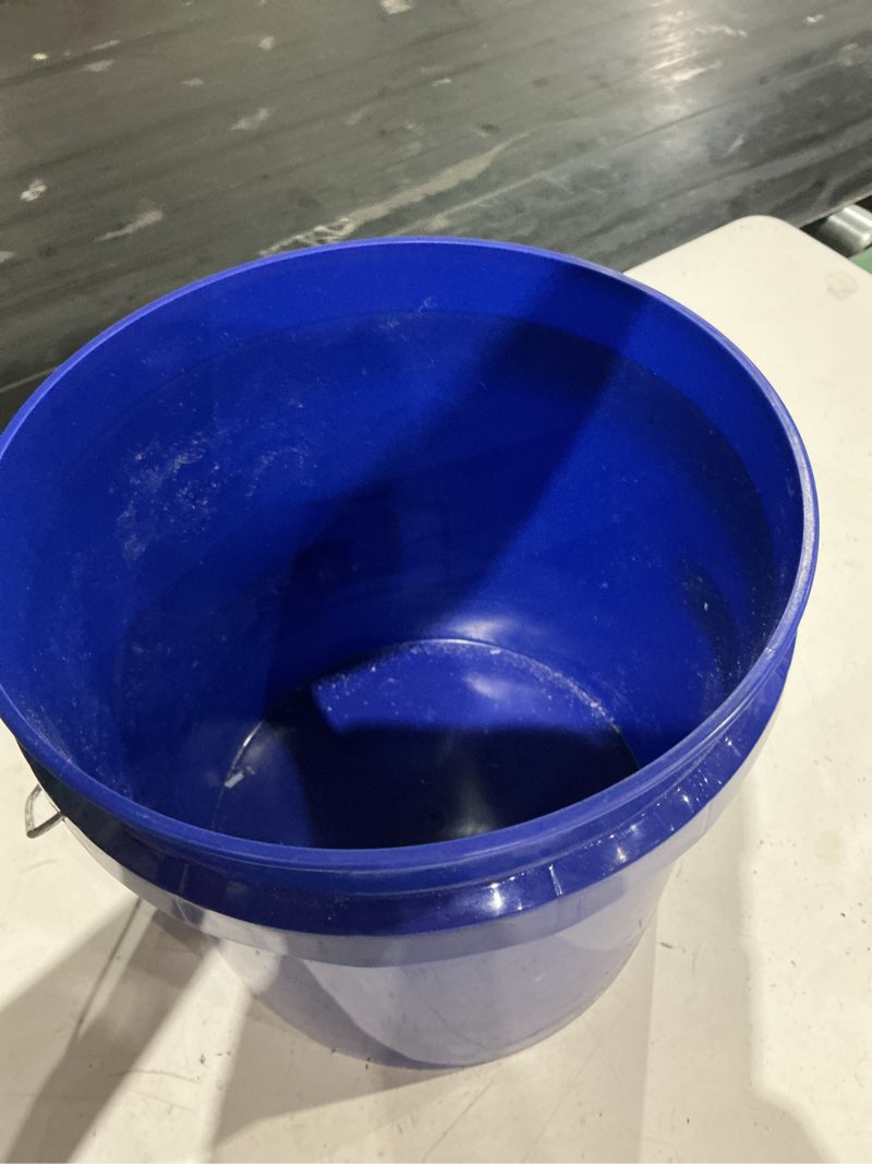 Condition photo showing As Is for united solutions 2-gallon white plastic bucket lid