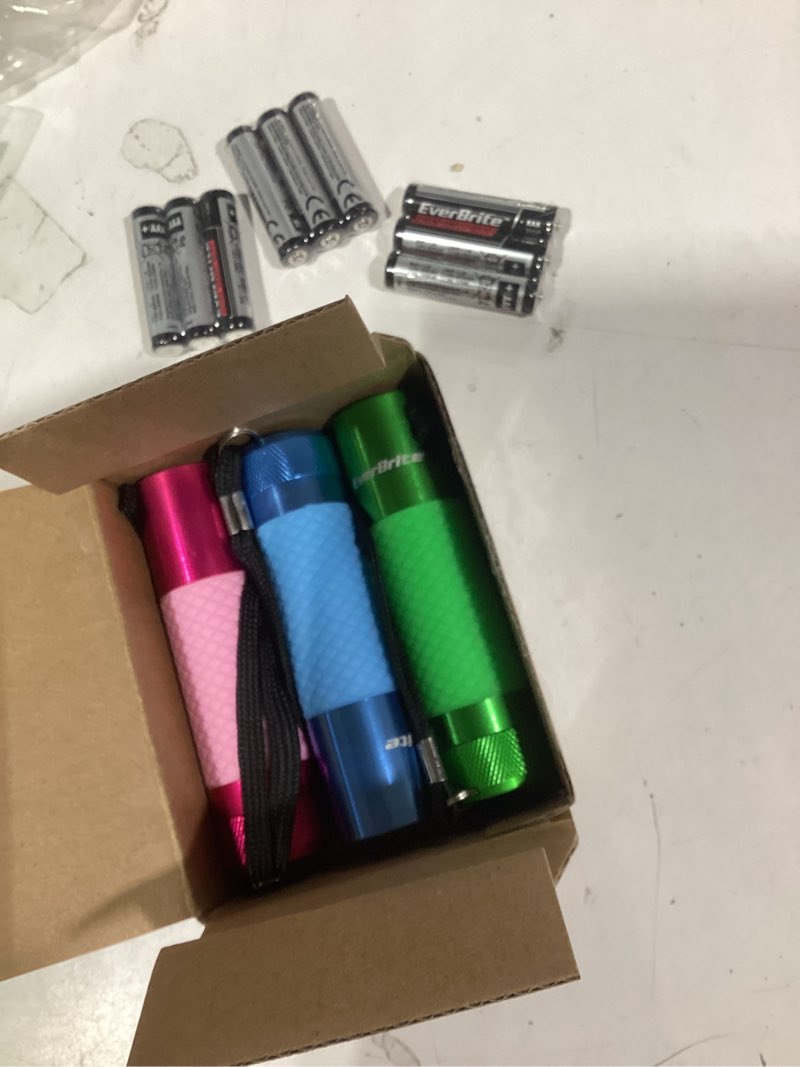 Condition photo showing Good Condition for everbrite 3-pack mini flashlights, glow in dark flashlights, aluminum led flashlights outdoor favors assorted colors for camping, hiking, indoor, 9xaaa batteries included