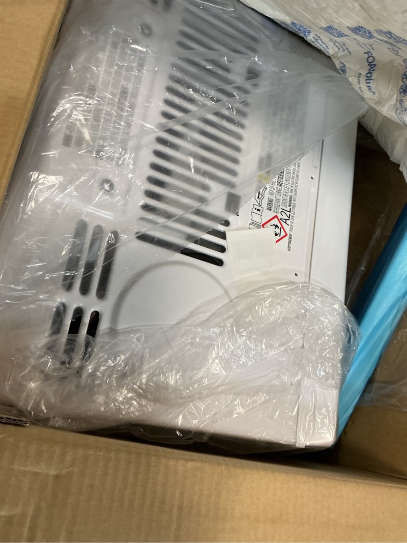 Condition photo showing As Is for midea 5,000 btu window air conditioner, cools up to 150 sq. ft. with easy-to-use reusable filter, remote, perfect ac for bedroom, living room, home office, electronic control 5,000 btu, electronic control