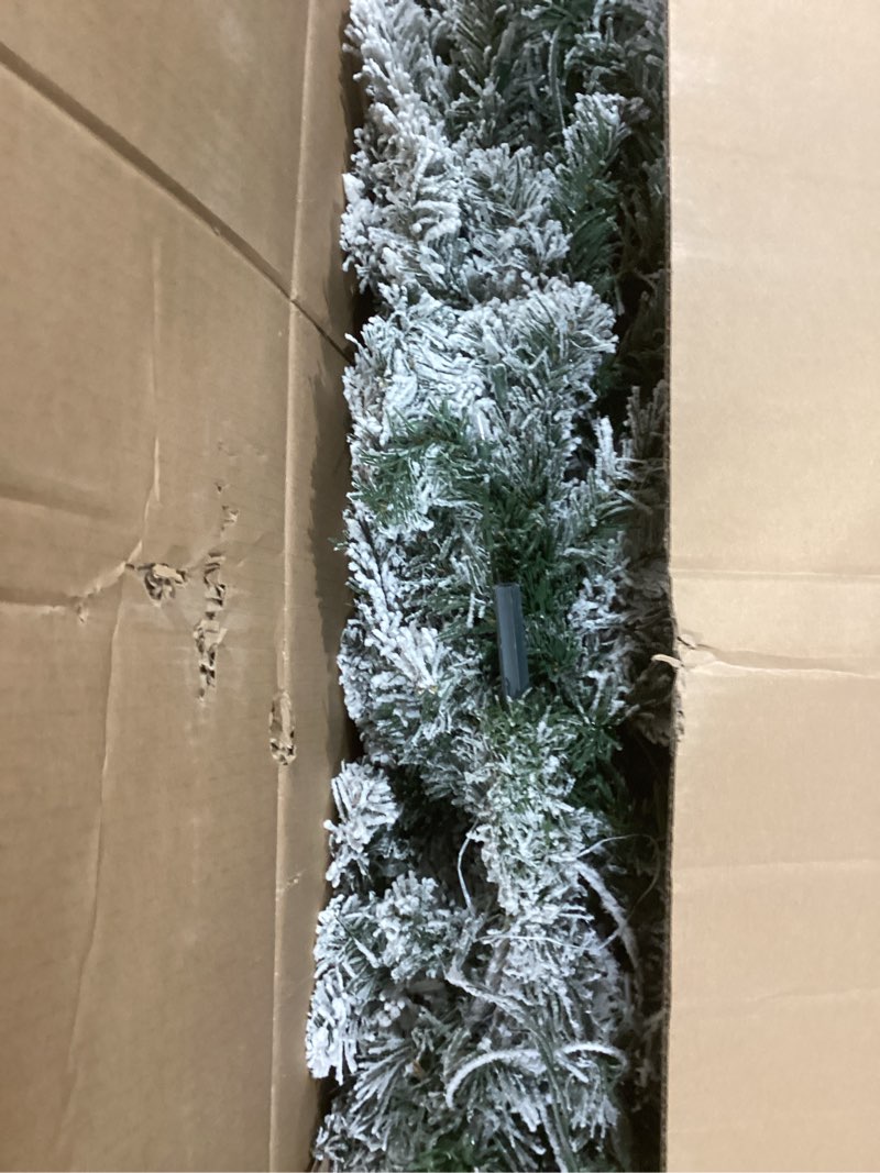 Condition photo showing Good Condition for National Tree Company 7.5 ft Pre-Lit Flocked Acacia Artificial Christmas Tree, 550 Clear Lights, 1,300 Branch Tips, Includes Stand, Green 7ft 6in