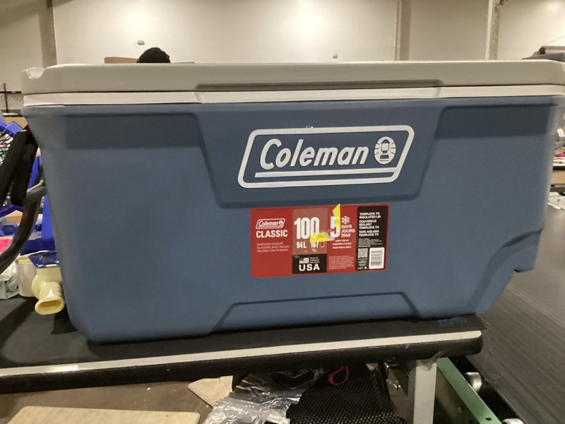 Condition photo showing As Is for coleman 316 series 100qt hard chest wheeled cooler, lakeside blue