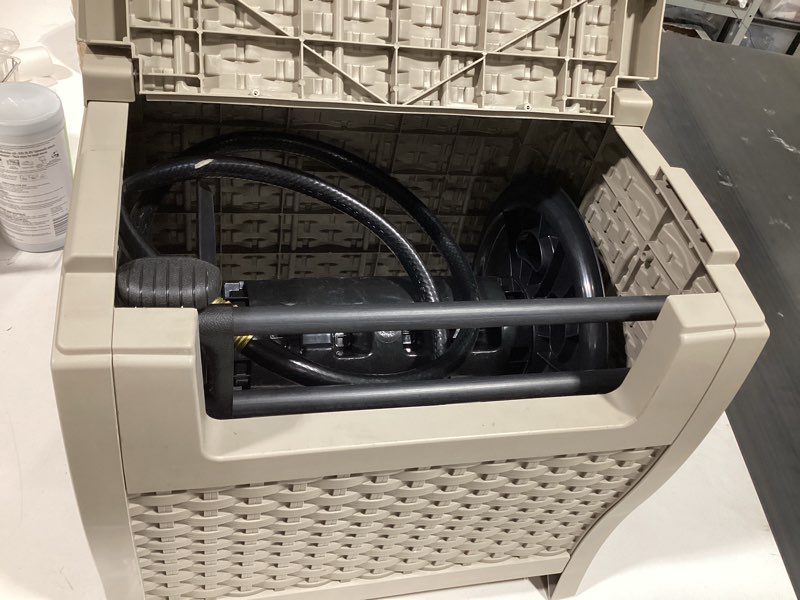 Condition photo showing As Is for  suncast slide trak hideaway plastic 175-ft container hose reel
