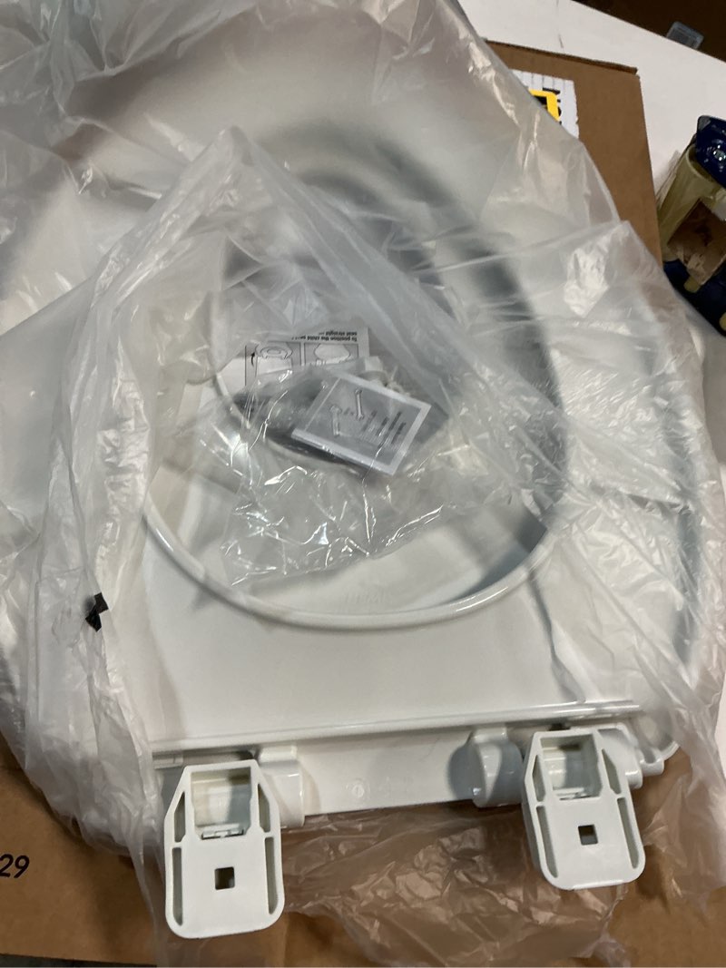 Condition photo showing New/Like New for Mayfair Little2Big? Elongated Plastic Toilet Seat in White with STA-TITE? Seat Fastening System? and Whisper•Close? Hinge