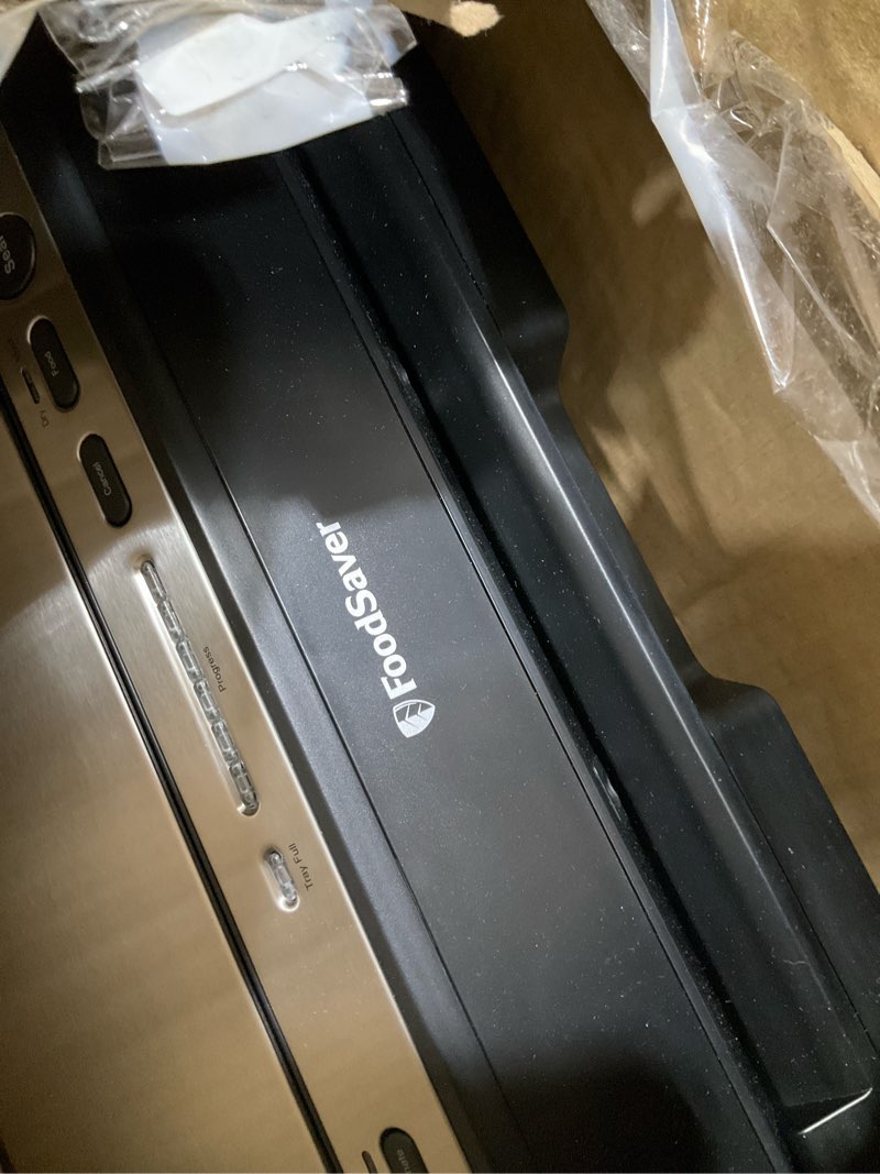 Condition photo showing As Is for foodsaver v4400 2-in-1 vacuum sealer machine with automatic vacuum sealer bag detection and starter kit machine & starter kit