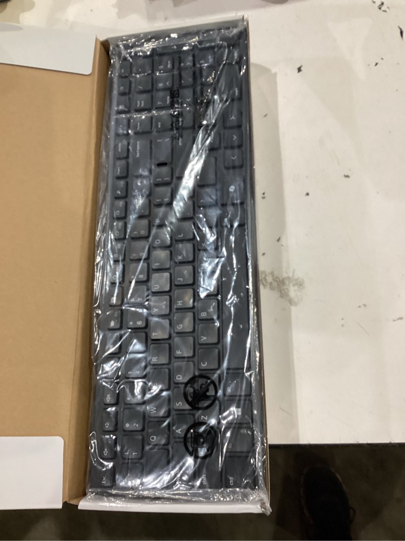 Condition photo showing As Is for dell km555 silent keyboard and mouse - 18 programmable shortcut keys, copilot key, secure dual-mode connectivity, adjustable dpi, ambidextrous, low battery led indicator, 3-year warranty - black