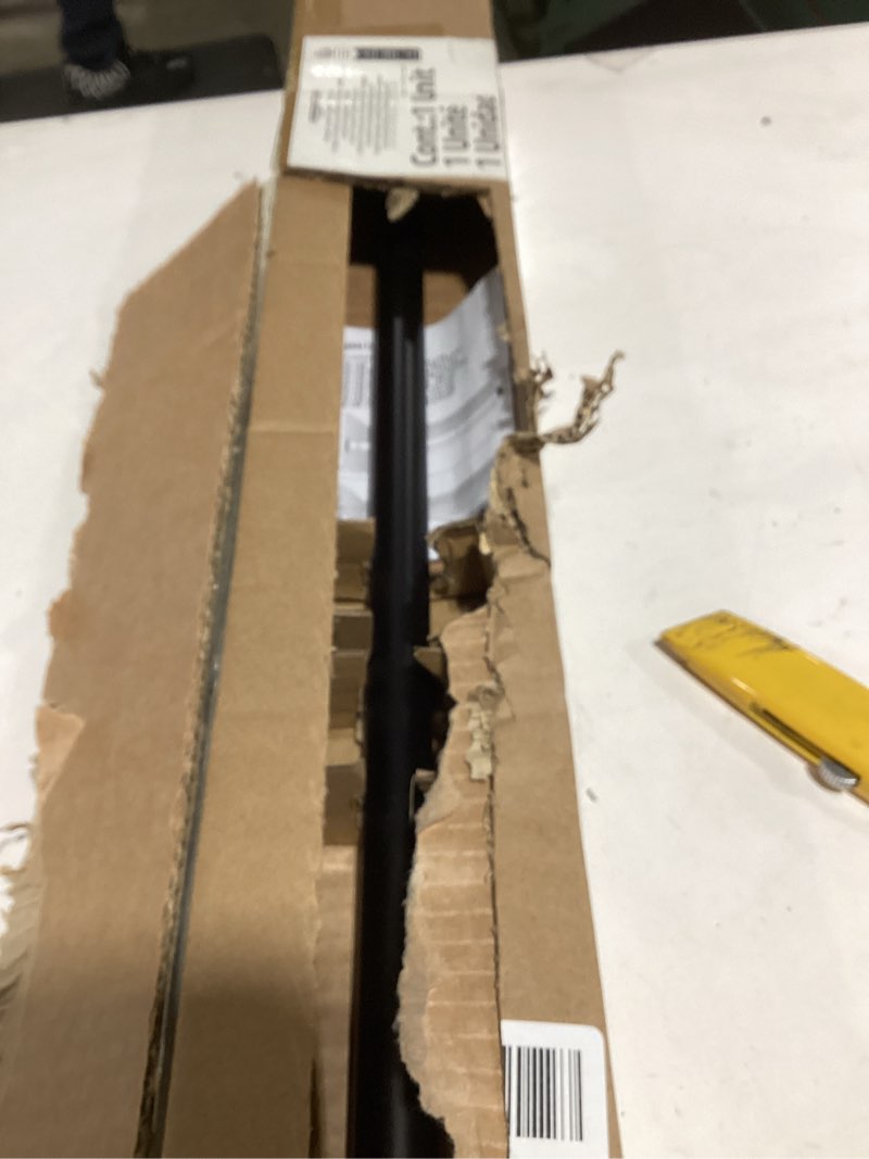 Condition photo showing Good Condition for Amazon Basics Adjustable Sturdy Spring Tension Curtain Rod, No Drilling/No Holes, 54-90", Black, Classic Finial Black 54-90" Indoor