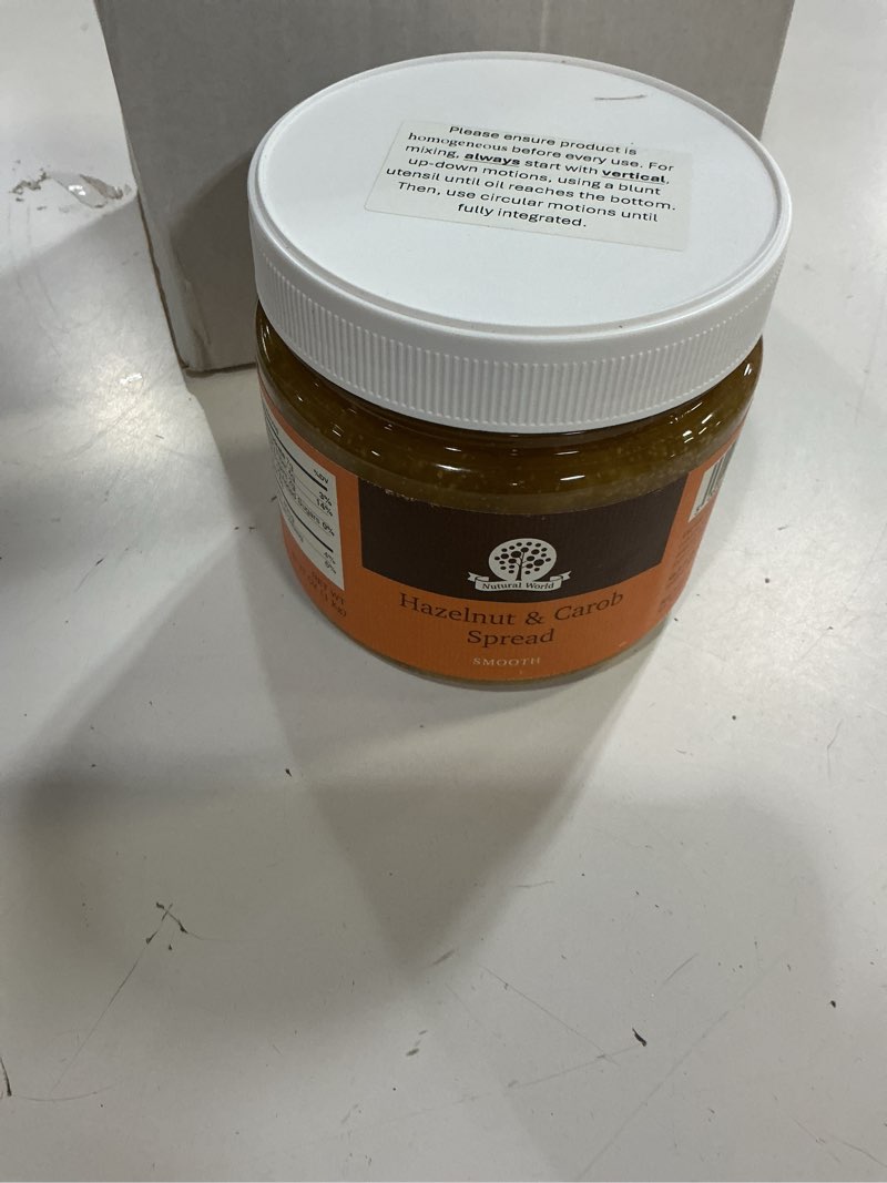Condition photo showing New/Like New for (best before:sep/05/2027)nutural world - smooth hazelnut and carob spread 35 oz (1kg) award winning product smooth 17 oz