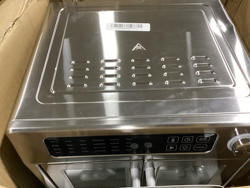 Condition photo showing As Is for Dan - Emeril Lagasse Extra Large French Door Air Fryer Toaster Oven Combo, 24 Cooking Functions and Digital Controls, 7 Accessories Included, Stainless Steel Finish, 26QT Capacity