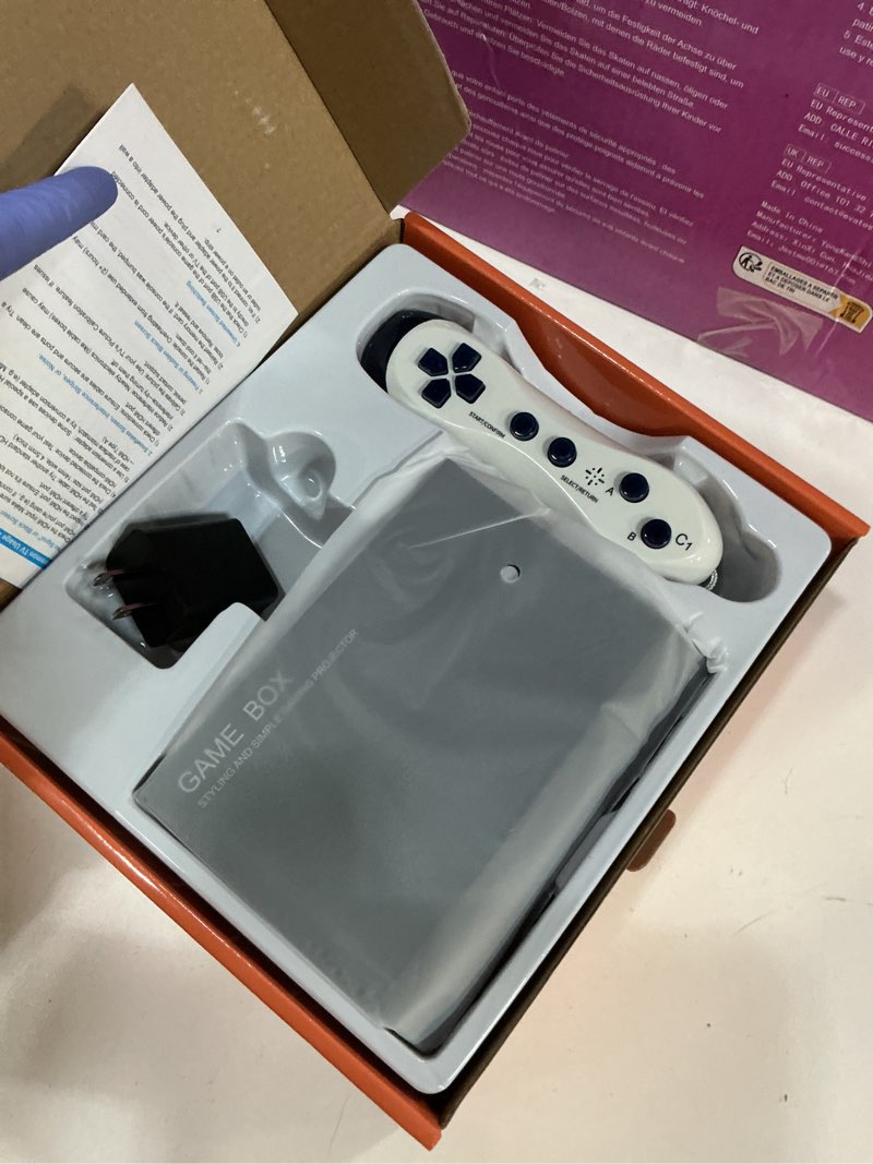 Condition photo showing Good Condition for AR Motion Gaming Console for Kids & Families - Plug & Play Video Game System for Indoor Physical Play & Interactive Family Fun. Great for Gifts, Game Nights, Parties, Playtime and Playdates Black & Gray (with controller)