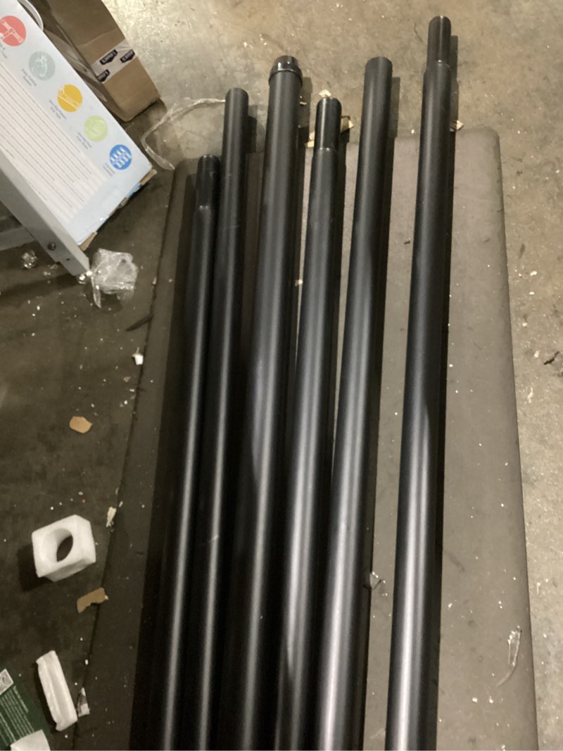 Condition photo showing As Is for miscellaneous black poles