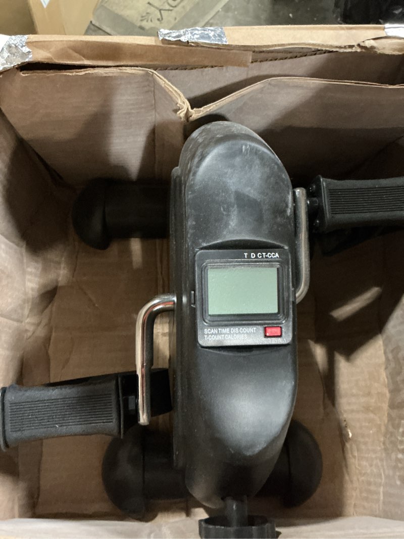 Condition photo showing As Is for under desk bike and pedal exerciser - at-home physical therapy equipment and exercise machine for arms and legs with lcd screen by wakeman fitness
