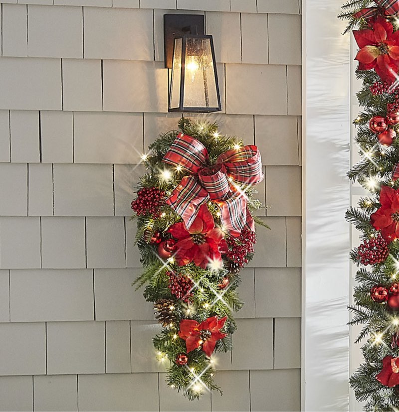 the cordless prelit poinsettia and ribbon holiday trim