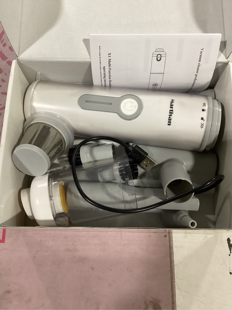 Condition photo showing As Is for martisan portable car vacuum, 20,000pa suction with strong bldc turbo, 3 speeds, 3-in-1 versatile vacuum, 30+ min long runtime, quick charging for desk, keyboard, car, silver sliver