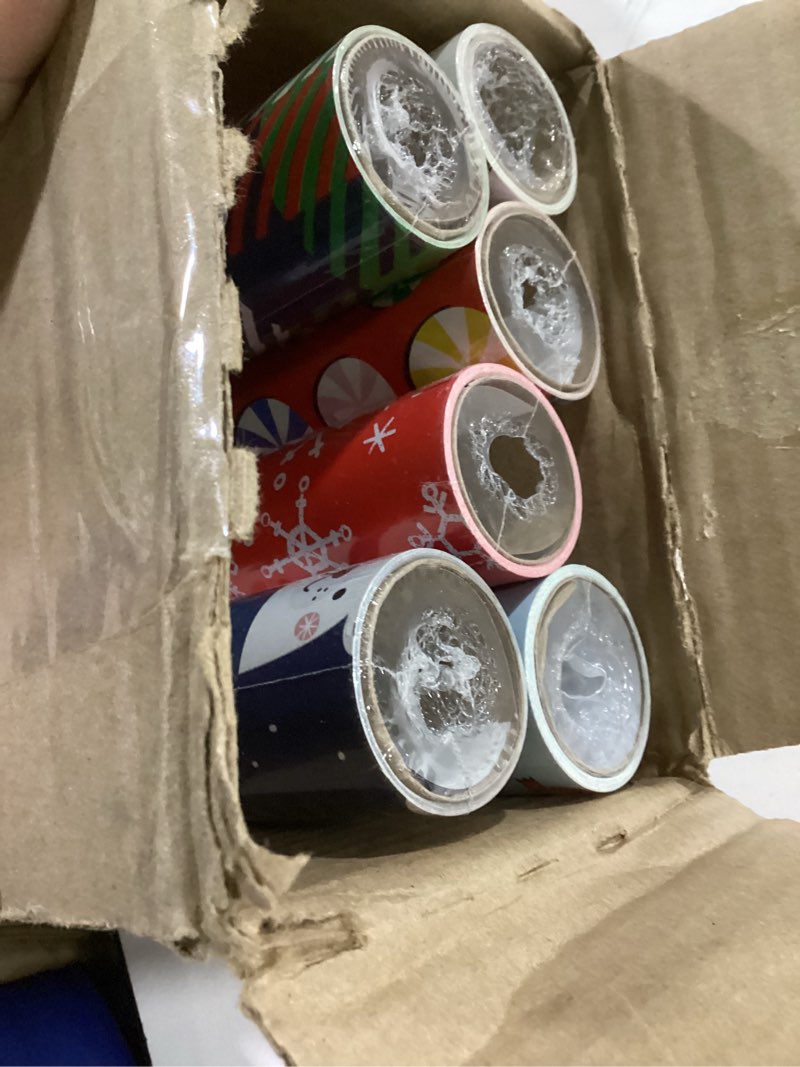 Condition photo showing Good Condition for Hallmark Kids Christmas Wrapping Paper Rolls with Cutlines on Reverse (6 Rolls: 180 Sq. Ft. Total) Dinosaur, Unicorn, Flamingo, Koala Snowman, Falala, Plaid, Snowflakes, Peppermints