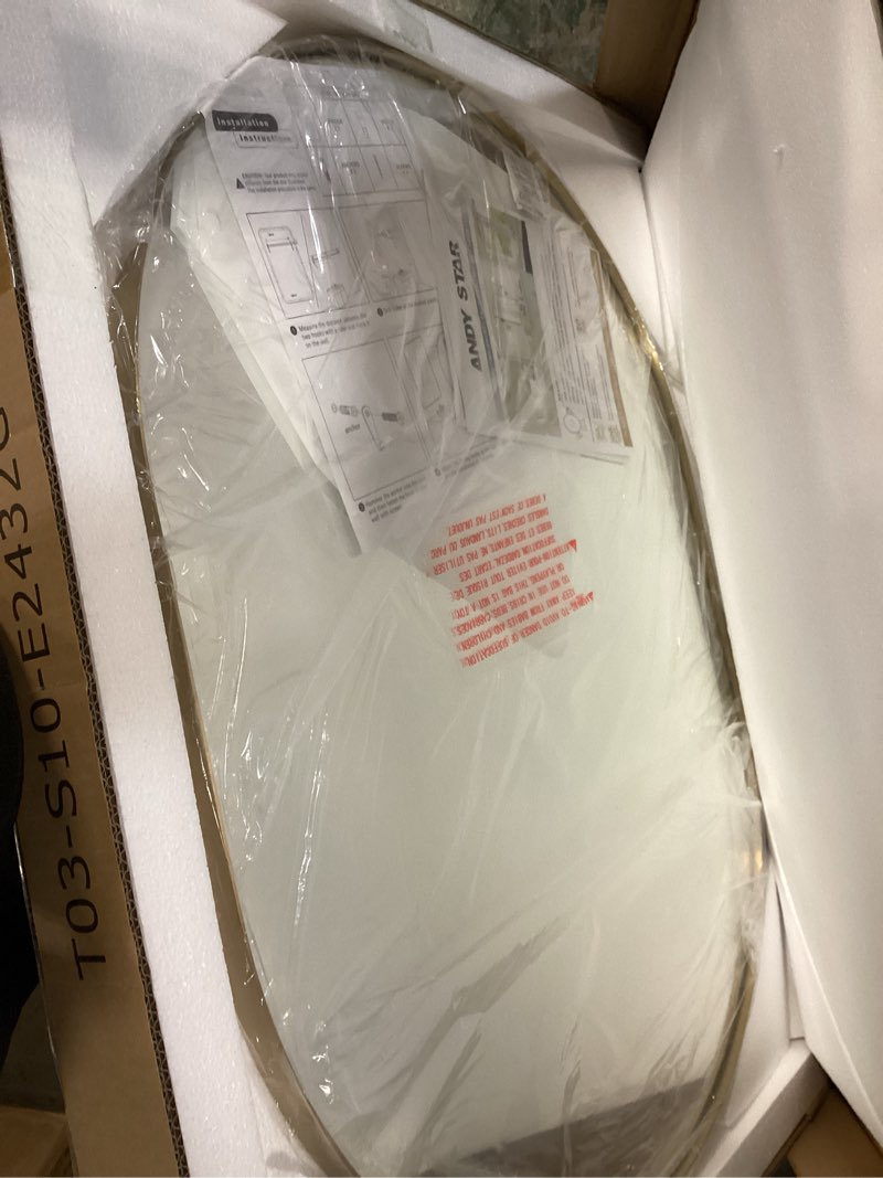 Condition photo showing New/Like New for ANDY STAR Oval Bathroom Mirror, 24x32’’ Gold Oval Mirror Pill-Shaped Design in Stainless Steel Metal Frame for Bathroom, Entryway, Living Room, Contemporary 1" Deep Wall Mount Vertical or Horizontal Gold 32"L x 24"W